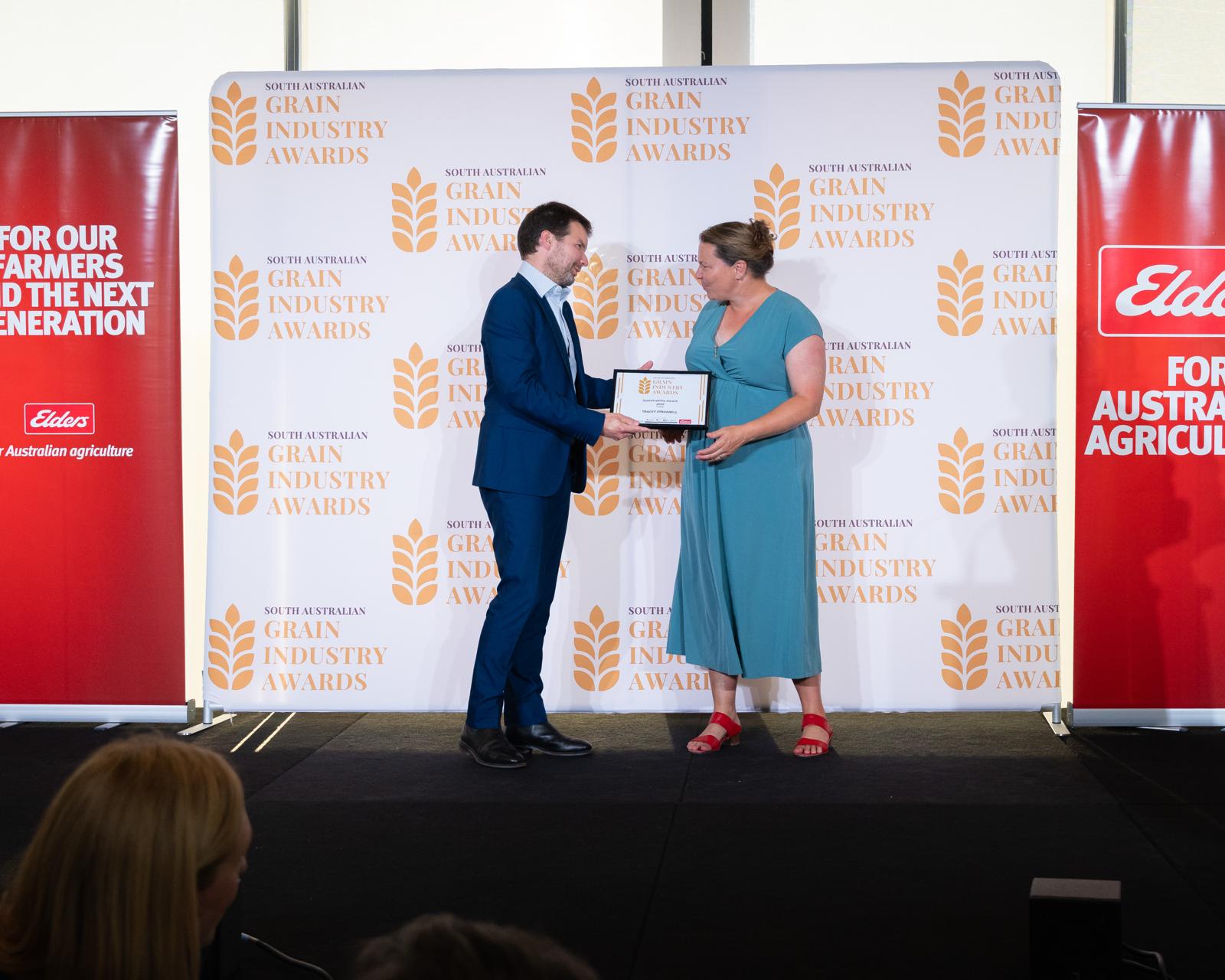 An award being presented on stage