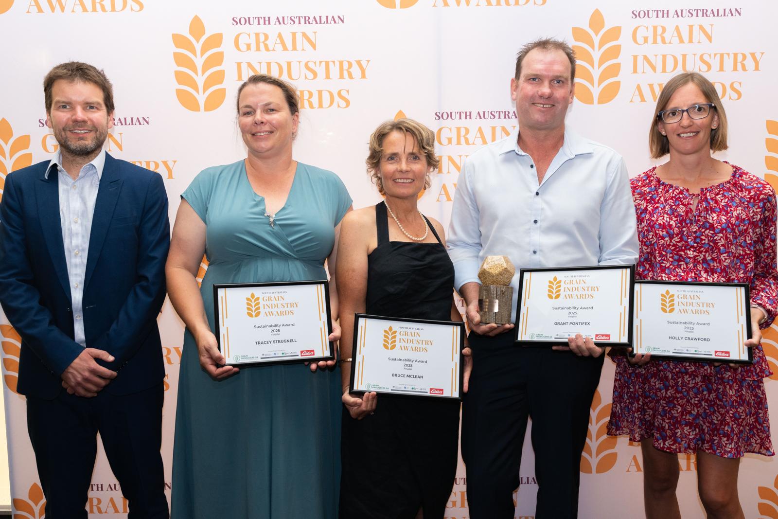 Award recipients with their certificates