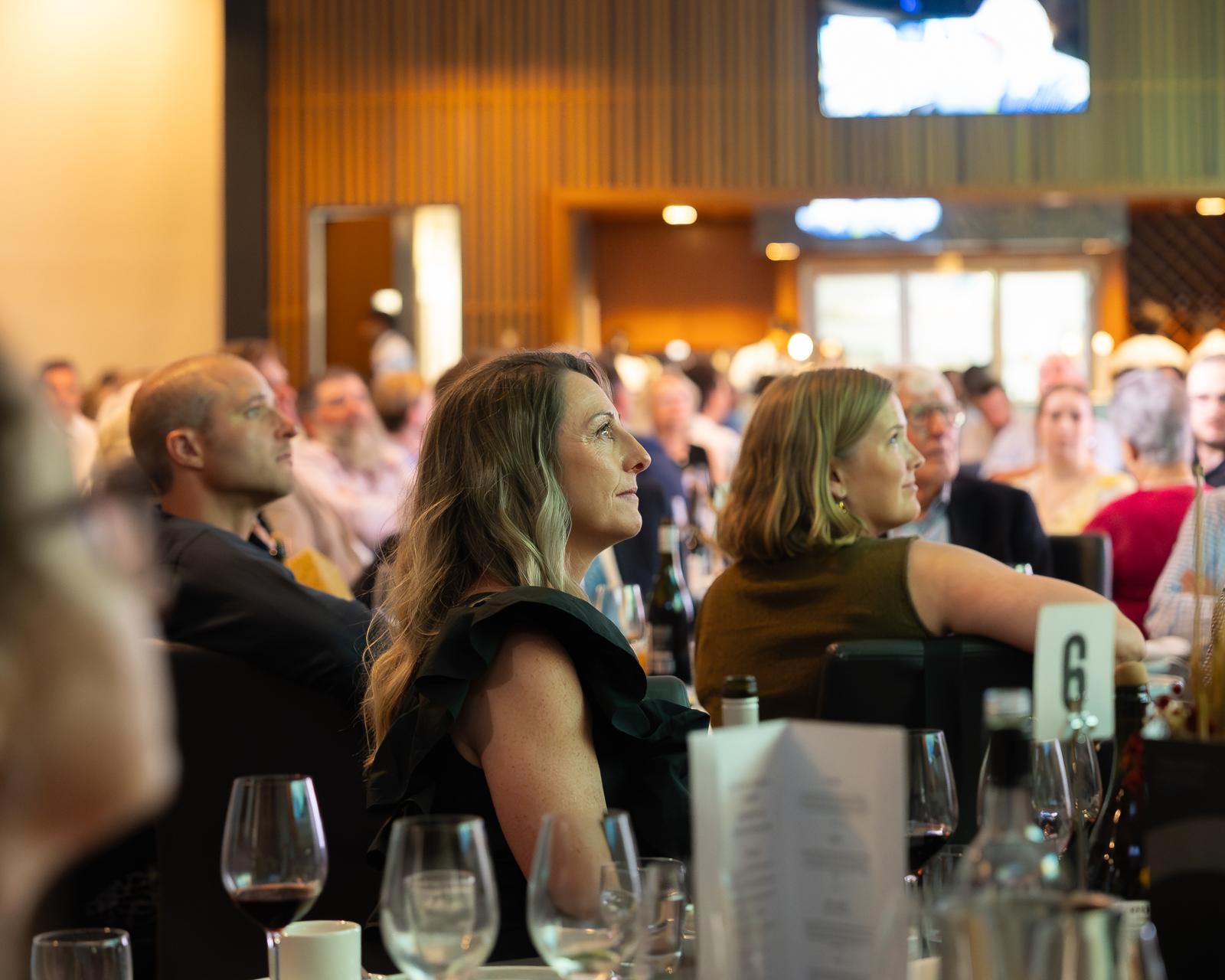 Guests at their tables during the dinner